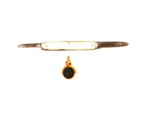 A 9 carat yellow gold swivel fob set with a 13mm cornelion to one side and bloodstone to other; 4.5mm pearl tie pin; 6mm pear