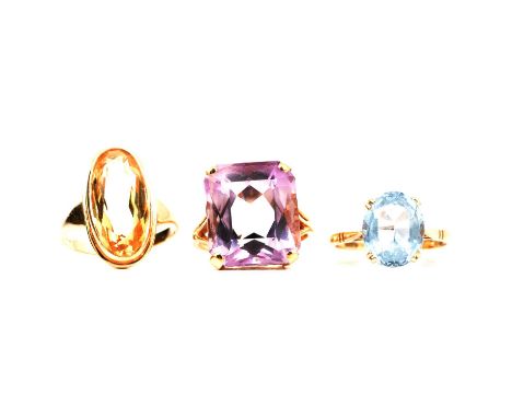 Three gemset dress rings, amethyst, citrine and synthetic blue spinel, an amethyst dress ring, the mixed cut amethyst, 6x4mm,