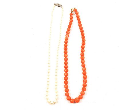 A cultured pearl necklace, seventy-five pearls graduating from 3.8mm to 7.5mm, fitted with a silver safety hook fastener mark