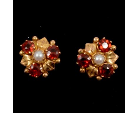 A pair of garnet and pearl earstuds, 12.5mm diameter, set with three garnets and a single pearl to centre, pierced fittings w
