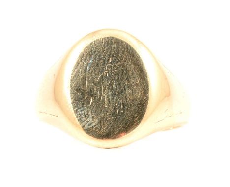 A 9 carat yellow gold signet ring, plain polished oval head with rubbed engraved initials, ring size U1/2, Birmingham 1960, 9