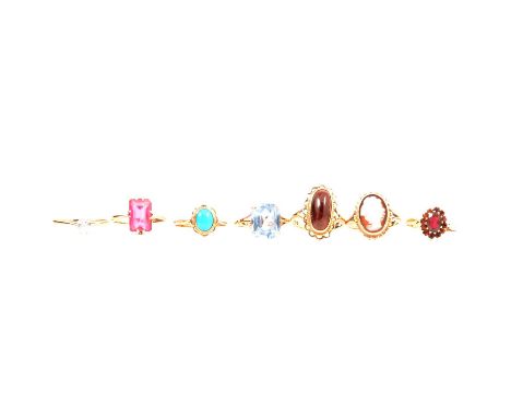 Seven gemset gold rings, cameo, amethyst, turquoise and others, a carved shell cameo ring, in a 9 carat yellow gold mount rin