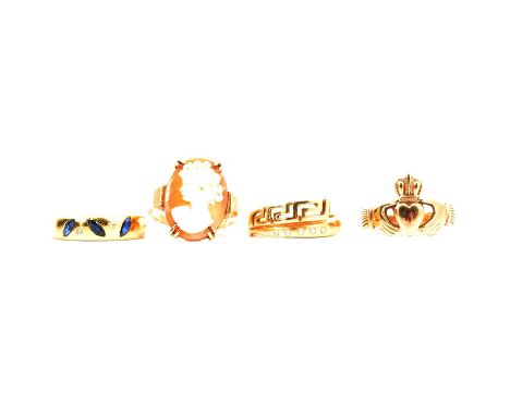 A cameo ring, Claddagh ring and two gemset rings, a cameo ring, the oval carved shell cameo, 18x13mm, of a female profile fac