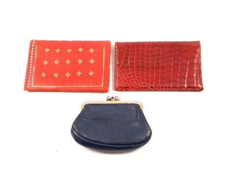 A collection of vintage wallets / coin purses, costume jewellery and collectables, red leather wallets; one red leather card 