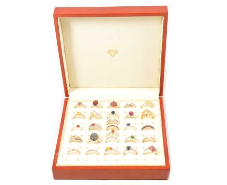 Twenty-seven gemset silver rings, andalusite, garnet, opal, ruby and others, a Gouveia andalusite and diamond ring, in a silv