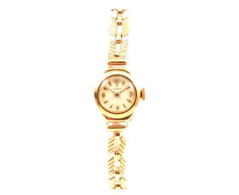 Roidor - a lady's 9 carat yellow gold bracelet watch, 13mm circular silvered baton dial with Arabic numerals at 12, 3, 6 and 