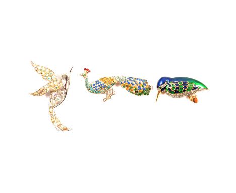 Thirty-four vintage bird brooches and dress clips, 1930’s and later, 80mm pink clear and green paste bird; flying crane; mult