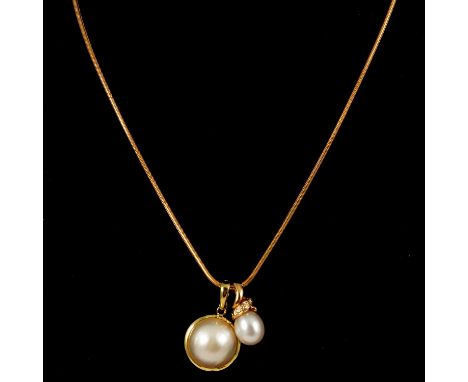 A cultured pearl and diamond pendant and chain, another pearl pendant, a cultured pearl and diamond pendant and chain, a 9mm 