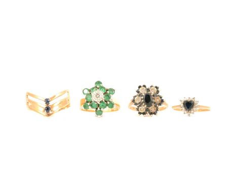 Four gemset rings, an emerald and diamond cluster ring, twelve circular emeralds claw set surrounding an illusion set brillia