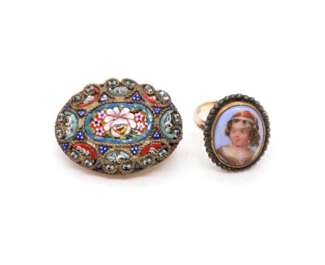 A micro mosaic brooch in gilt metal mount, 38x22cm; a portrait ring, ceramic plaque 14x10mm, of a young girl with ringlets, c