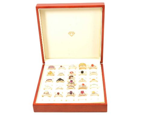 Twenty-seven gemset silver rings, garnet, opal, topaz, umbalite and others, a Rajasthan garnet and white topaz ring, in a sil