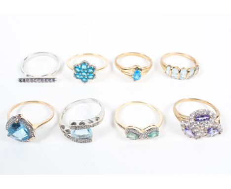 A collection of eight gemstone set dress rings. One silver, remainder hallmarked for 9ct gold. Size range from P to R Gross w