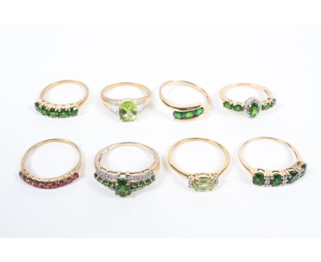 A collection of eight gemstone set dress rings, all individually hallmarked for 9ct gold. Size range from O to R. Gross weigh