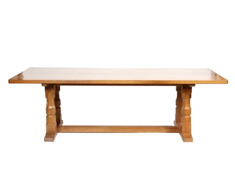 Robert Mouseman Thompson workshop, an 8' (eight foot) oak refectory dining table, the adzed top on a trestle base with twin o