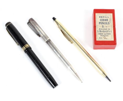 The Conway Stewart, No 388 vintage fountian pen; a silver propelling pencil with engine turned decoration and a gold coloured