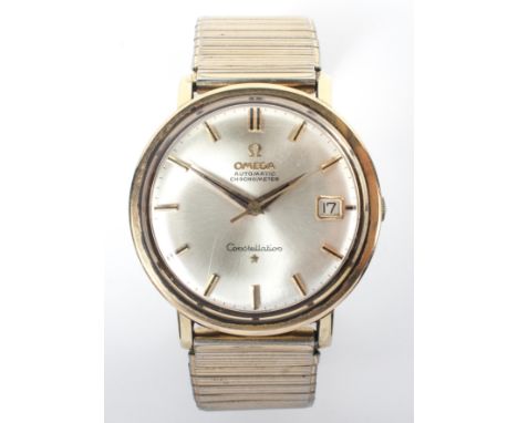 A gold plated Omega automatic chronometer constellation wristwatch. 35.0mm case with silver dial, baton markings and date fea