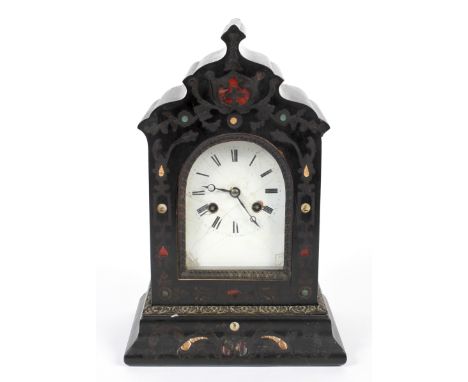 A 19th century French mantel clock, white enamel dial with Roman numerals and marked 'Azur of Paris', within a wooden case la