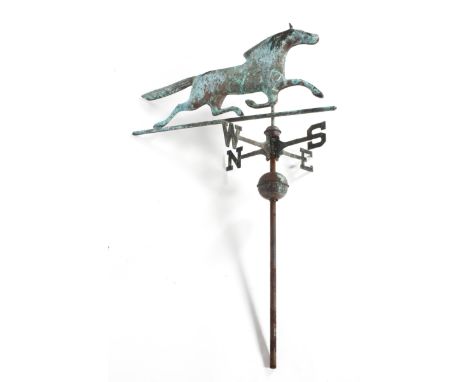 Folk Art: a copper weather vane in the form of a running horse above the points of the compass, total height 123cm x 81cm wid
