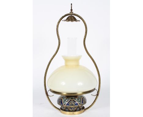 A Doulton Lambeth stoneware ceiling oil lamp, with stylised foliate decoration, impressed marks, 16cm diameter; in a brass fr