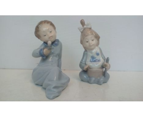 Lladro figure of a baby boy together with a Nao figure of a baby girl