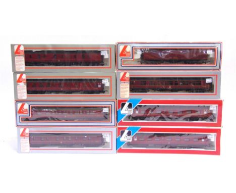 [OO GAUGE]. SEVEN LIMA B.R. COACHES  each in lined maroon livery; together with a Siphon G van, maroon livery, each boxed, (8