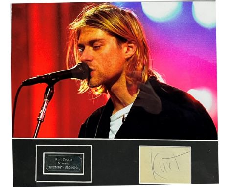 POP MEMORABILIA - KURT COBAIN (1967-1994), NIRVANA A clipped autograph book page, signed in pencil 'Kurt', mounted with a por