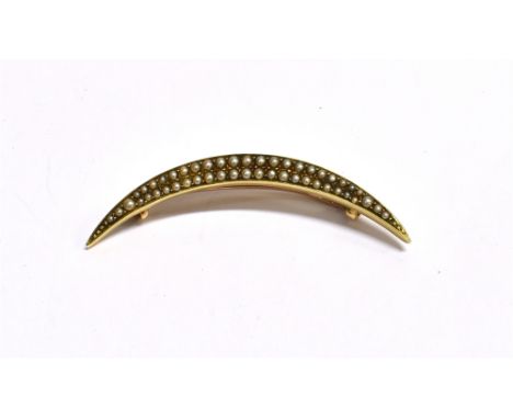 VICTORIAN SEED PEARL CRESCENT BROOCH5cm long grain set with half seed pearls on wire wire and 'C' hook clasp. No assay marks 
