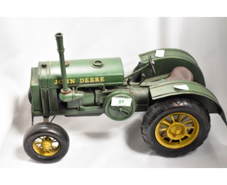 A collectable pressed metal model of a John Deere 1931 GP tractor, measuring 35cm long