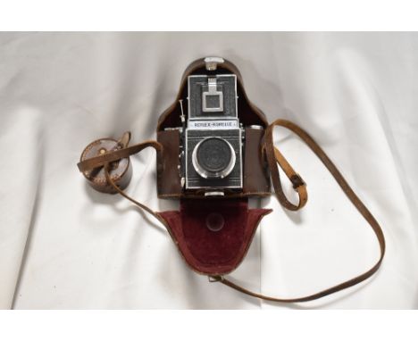 A vintage Reflex Korelle camera in leather case.