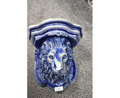 A Rhenish pottery salt glazed lion head wall bracket.Condition report - This bracket measures 24cm tall. It appears to be in 