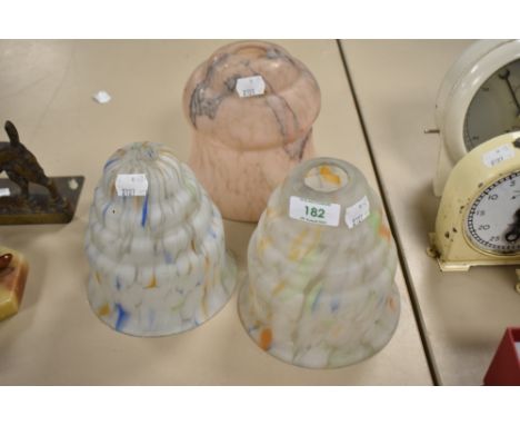 A group of three vintage mottled glass light shades
