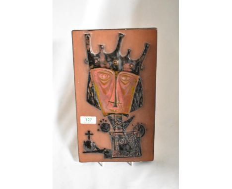 A mid century terracotta tile having abstract depiction of a king.