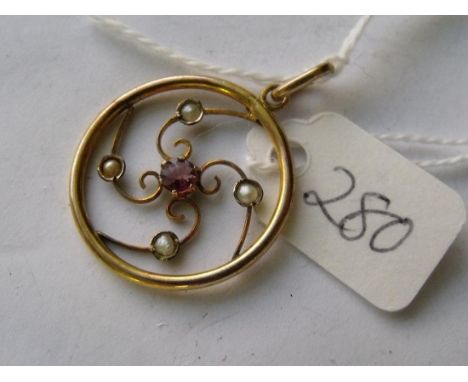 A circular amethyst and pearl set antique  gold mounted pendant      
