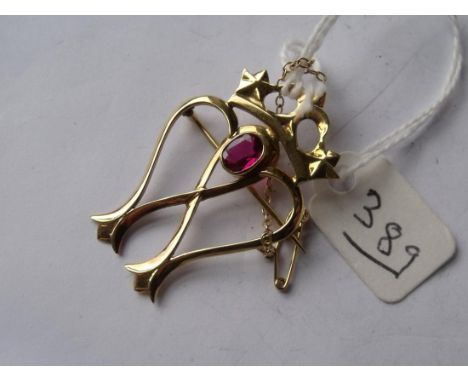 18ct gold brooch set with ruby stamped CH    