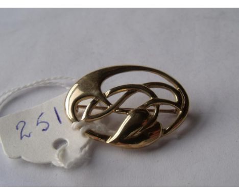Gold Art Nouveau style brooch in the form of a  naturalistic plant       