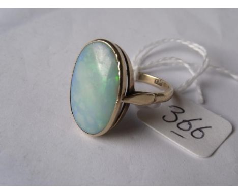 A large oval 9ct mounted opal ring    approx size 'R'        