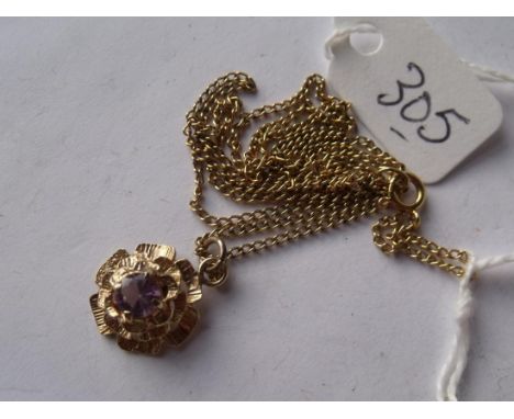 9ct flowerhead amethyst set pendant  on 9ct chain 3.1g       