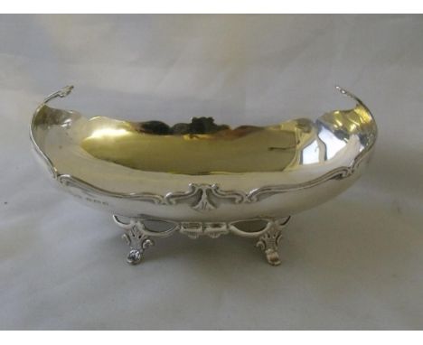 A boat shaped bon bon shaped basket on bracket feet     6” wide Birm. 1913 100g        