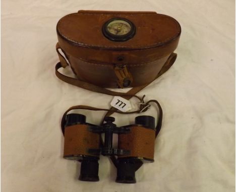 A cased pair of US Signal Corp Bausch &  Lomb binoculars w/ compass      