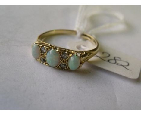 18ct gold opal & diamond set ring 'O'    