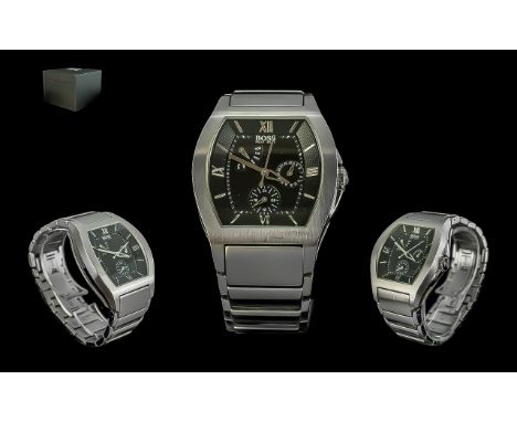 Hugo Boss Gents Calendar Watch. An attractive steel bracelet watch with black dial, silver batons, 24 hour and day/date displ