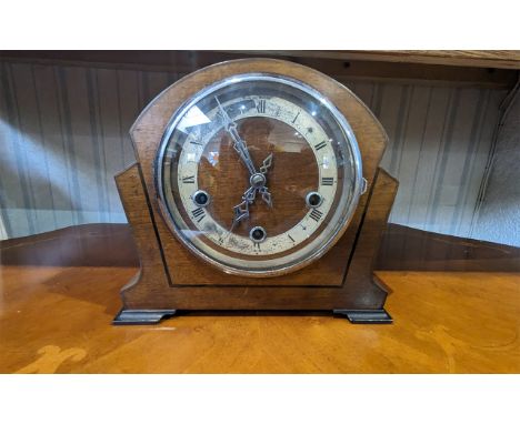 Early 20th Century Art Deco Mantle Clock, silver chapter dial with Roman numerals.  