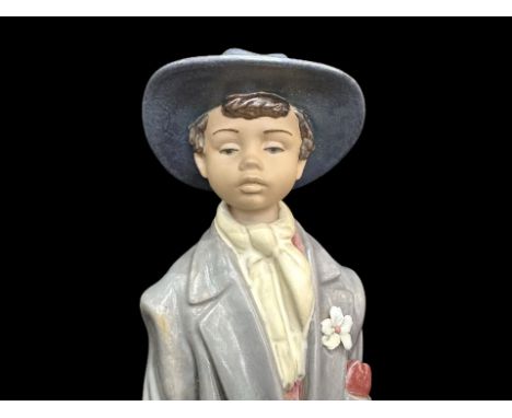 Lladro Gres Figure 'Hora De Partir' - 'Time To Go' - No. 12389, in original box and packaging, figure depicts a young man wit