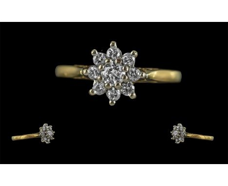Ladies 18ct Gold Attractive Diamond Set Cluster Ring. Full Hallmark to Interior of Shank. The Round Faceted Diamonds of Good 