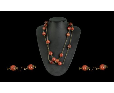 Vintage Banded Agate Long Necklace, set with 17 round stones, together with a matching pair of drop earrings.