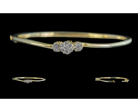 14ct Gold Good Quality Diamond Set Hinged Bangle, marked 14ct, with three diamond set clusters of excellent colour and clarit