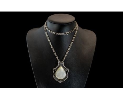 Large Silver Statement Pendant &amp; Chain, pendant set with white opal style stone surrounded by silver scrolling pattern wi