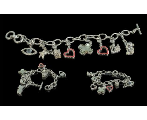 Ladies Chunky Swarovski Bracelet Loaded with Charms. Charms Includes Heart, Swan, Teddy Bear, Star, Eye etc. 