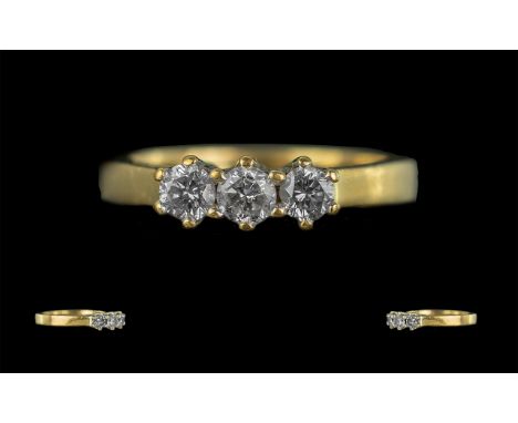 Ladies 18ct Gold Attractive Three Stone Diamond Set Ring, marked 18ct to shank with full hallmark, the three round brilliant 