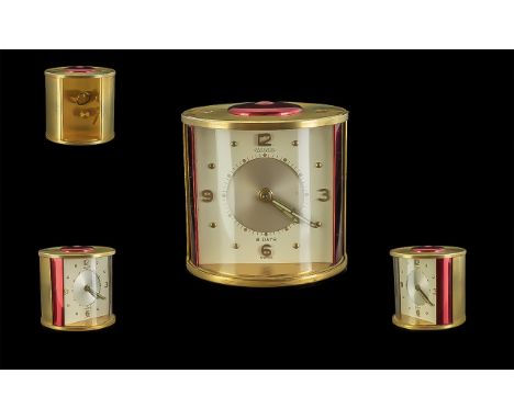 Jaeger - Le - Coultre 1930's Miniature Circular Form Desk Top 8 Days Alarm Clock, Gold and Red Colour way. With Opening and C